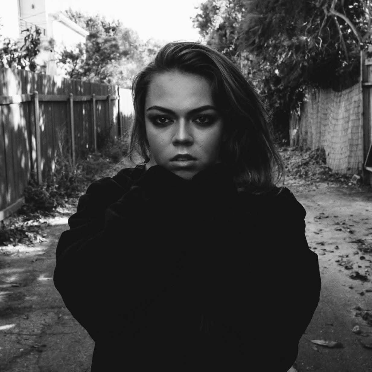 Cinematic black-and-white portrait of Inna Lizett